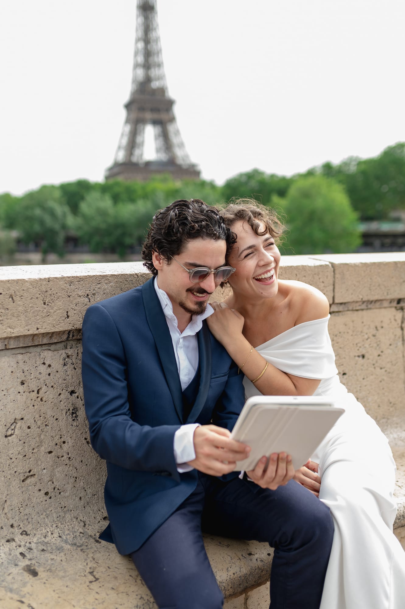A couple using their Client Portal in Paris